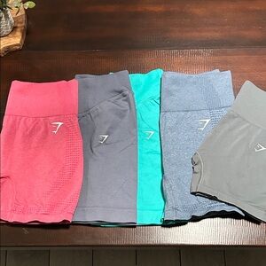 Gymshark Seamless High-Waist Shorts in Pink, Charcoal, Teal, Blue, and Gray